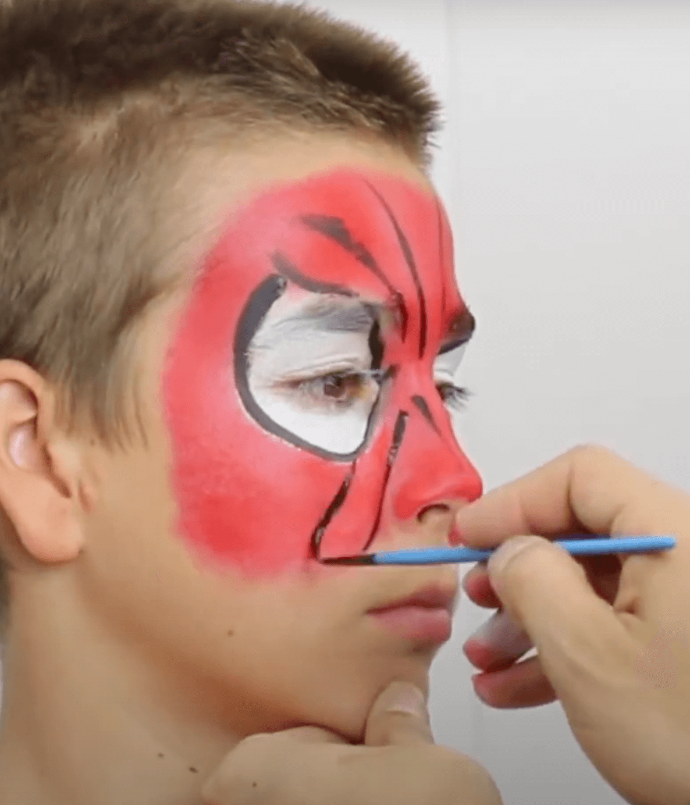 kids face painting spiderman