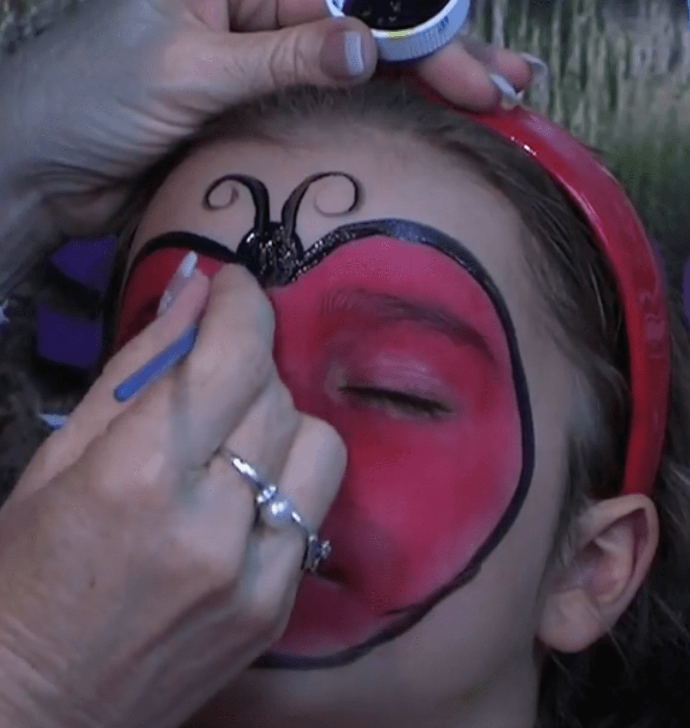 Face paint design Ladybug Step 3